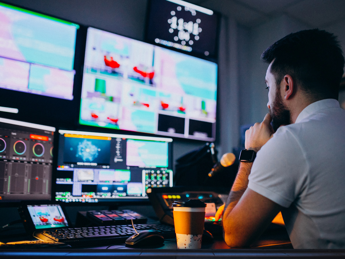 Full-service AV production setup with live sound, lighting, and video at a corporate event