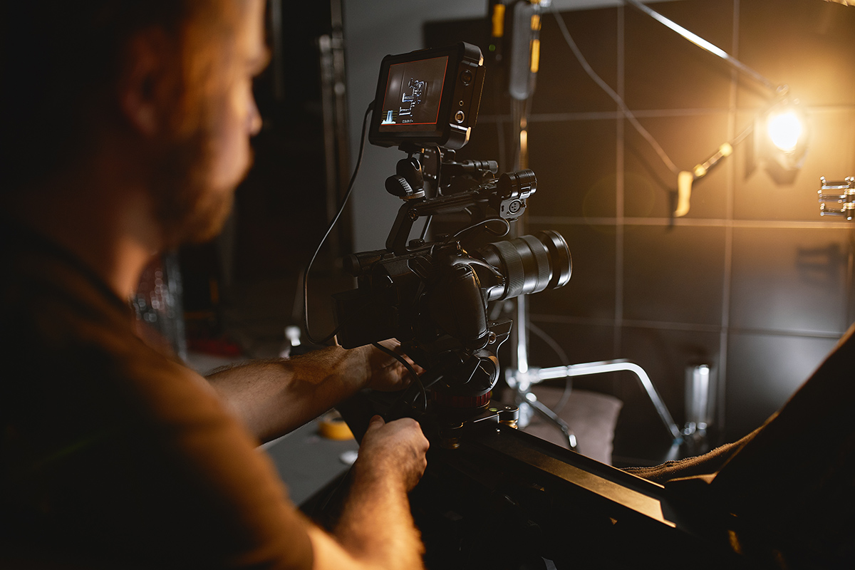Production crew and technical director coordinating a live multi-camera shoot